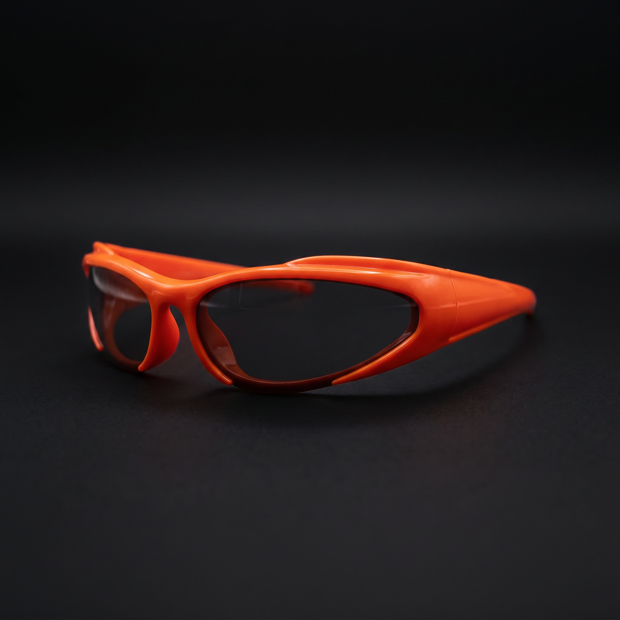 Y2K Speed Wrap sunglasses orange colorway studio close-up