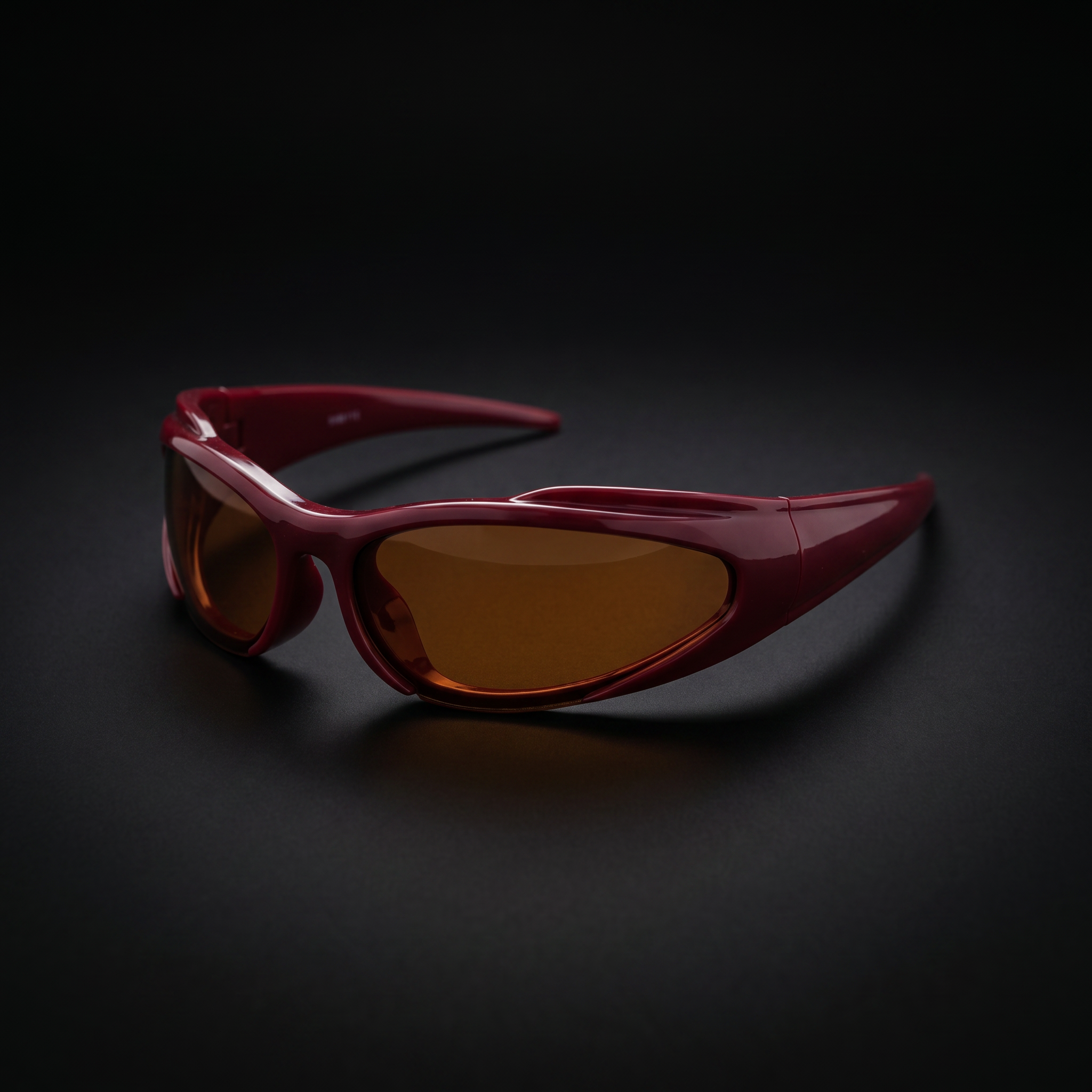 Y2K Speed Wrap sunglasses burgundy colorway studio close-up
