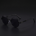 Black round steampunk sunglasses with dark smoke lenses and spring temples