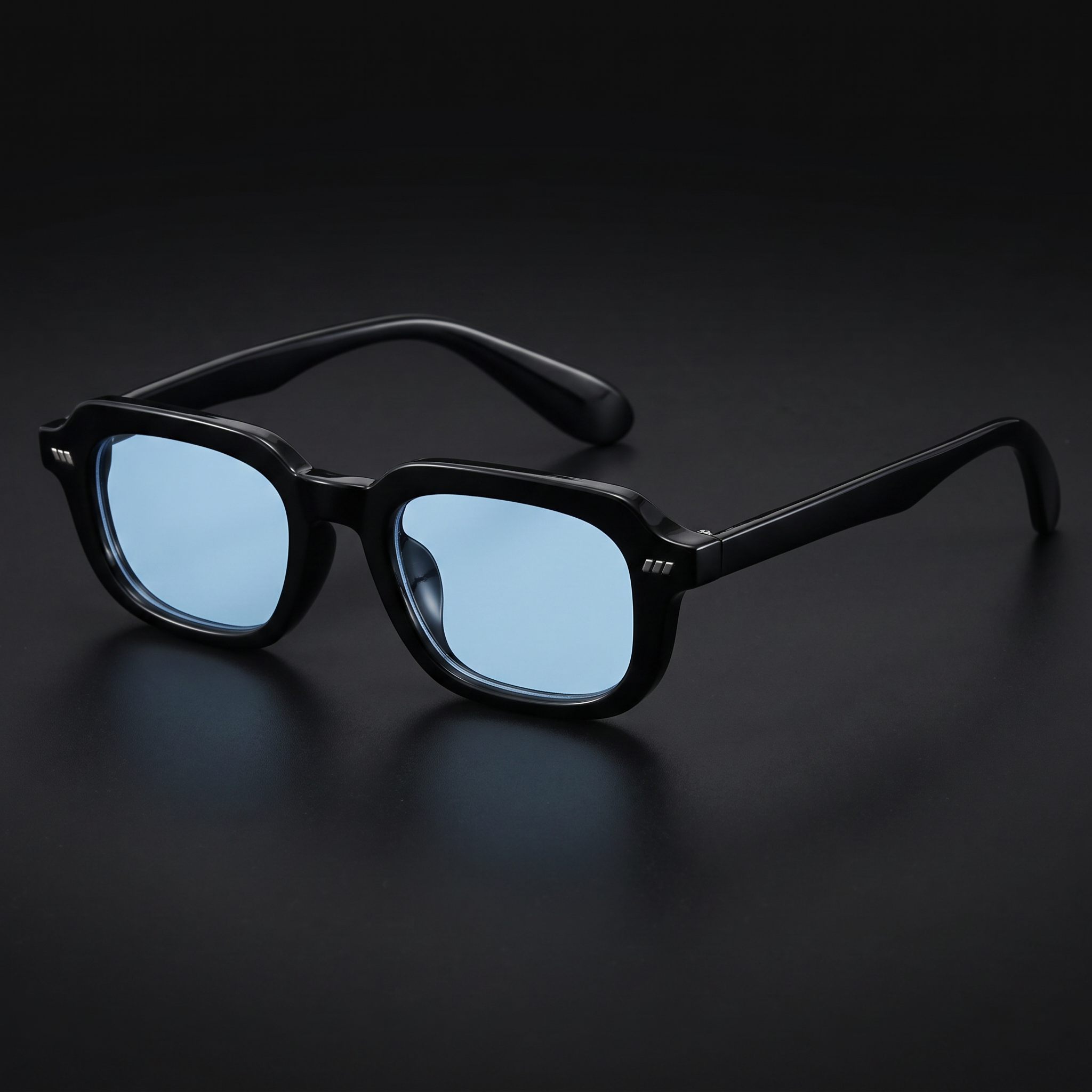 Small square Y2K sunglasses in black with sky-blue candy lenses, studio close-up